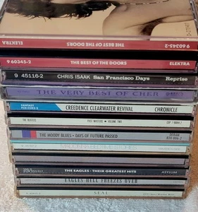 11 Rock CD Lot - Doors, Eagles, Madonna, Janet Jackson, Cher, Etc.. - Foto 1 di 23