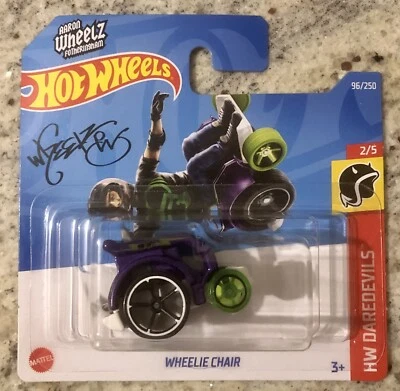 Hot Wheels WHEELIE CHAIR VIOLA AARON WHEELZ  2022 1:64 - Immagine 1 di 2