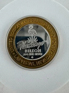 FLAMINGO LAS VEGAS NV $10  .999 FINE SILVER HILTON CASINO GAMING TOKEN 1999 - Picture 1 of 3