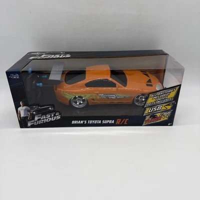 Coche naranja Fast & Furious Brian's Toyota Supra R/C con control remoto Jada Toys -- NUEVO Foto 1 de 4