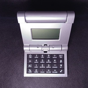 [L001] CALCOLATRICE / OROLOGIO DA SCRIVANIA TASCABILE - NOT TESTED - Picture 1 of 6