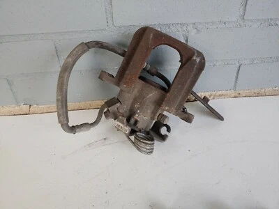 Pinza de freno trasera Ford Taurus 2010-2012 y manguera lado del conductor OEM LH Foto 1 de 4