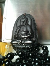 Kalung dan medal yang cantik diukir dalam obsidian. Kalung termasuk. Baru