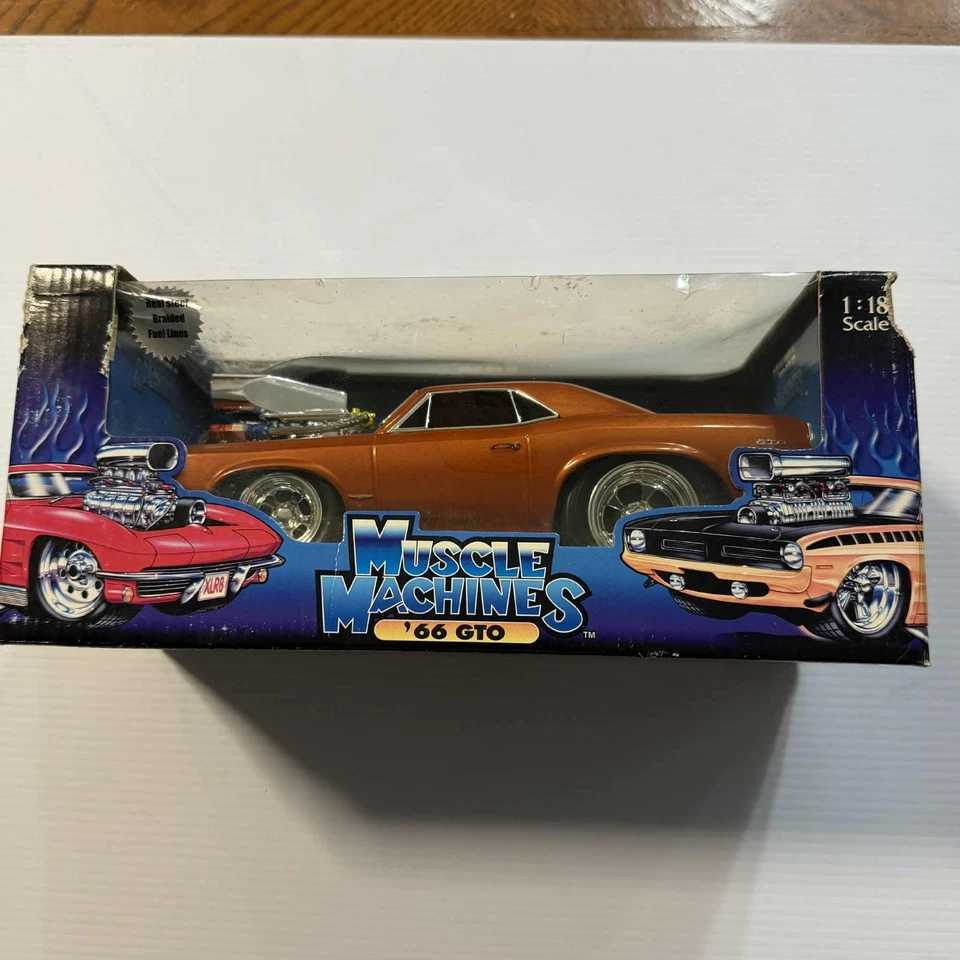 Vintage Muscle Machines Too Hot '66 GTO in ORANGE  1:18 Diecast - Image 1 of 4
