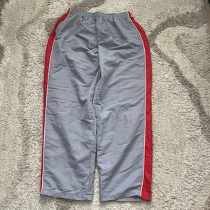Vintage Wilson Track Pants Size XL Windbreaker Lined Ankle Zip 90s Wide Leg - Picture 1 of 8