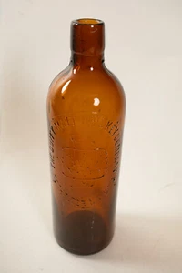 Duffy Malt Whiskey Bottle (R3R-44) Amber Liquor Bottle (JSF6) Company 1886 Base - Picture 1 of 10