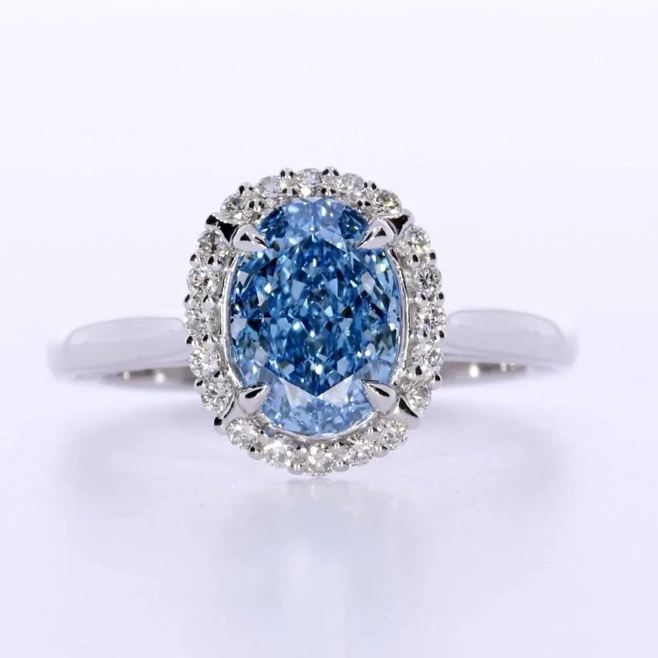Anillo de diamantes cultivados en laboratorio azul vivo corte ovalado de 1,50 quilates certificado IGI de oro blanco de 14 k Foto 1 de 4