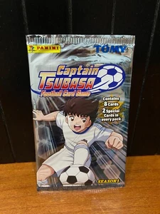 BUSTINA CAPTAIN TSUBASA FOOTBALL CARD GAME NUOVO SIGILLATO PANINI - Imagen 1 de 2