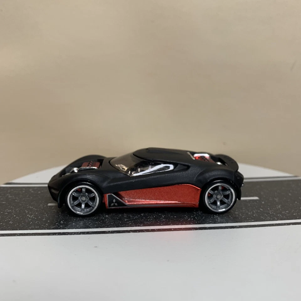 Hot Wheels Designers Challenge Mitsubishi Double Shotz Concept Car negro/rojo casi nuevo Foto 1 de 4