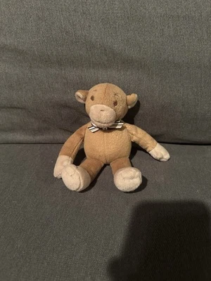 Mono pequeño marrón Baby Gap con pajarita Foto 1 de 2