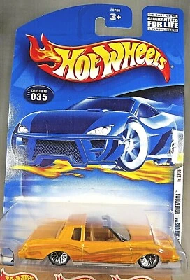 2001 Hot Wheels #35 First Editions 22/36 MONTEZOOMA Yellow w/Chrome Lace Spokes - Image 1 of 4