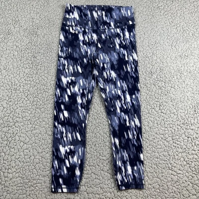Leggings Under Armour para mujer ajustados medianos bolsillo al tobillo Foto 1 de 4
