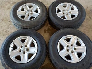 2020 Jeep Wrangler 17x7.5" factory wheels 5x5 Mixed Bridgestone 245/75R17 Tires - Picture 1 of 11