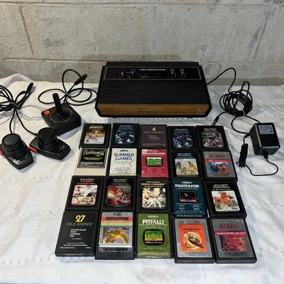Consola Atari 2600 4 Switch Woodgrain Joystick Paletas Cables y 20 Juegos Probados Foto 1 de 4