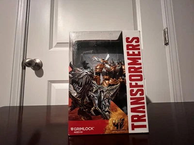 Transformers Era de la Extinción Dinobot Grimlock Voyager Class 2014 De vuelta en caja Foto 1 de 4