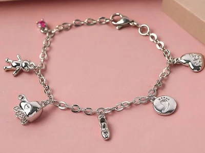Karis Niassa Ruby(FF) Platinum Bond Baby's Love Charm Bracelet (7.25 In) 0.25ctw - Image 1 of 4