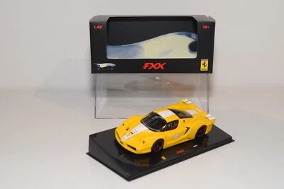 A56 1:43 HOTWHEELS ELITE FERRARI FXX GIALLO MIB 2 - Immagine 1 di 4