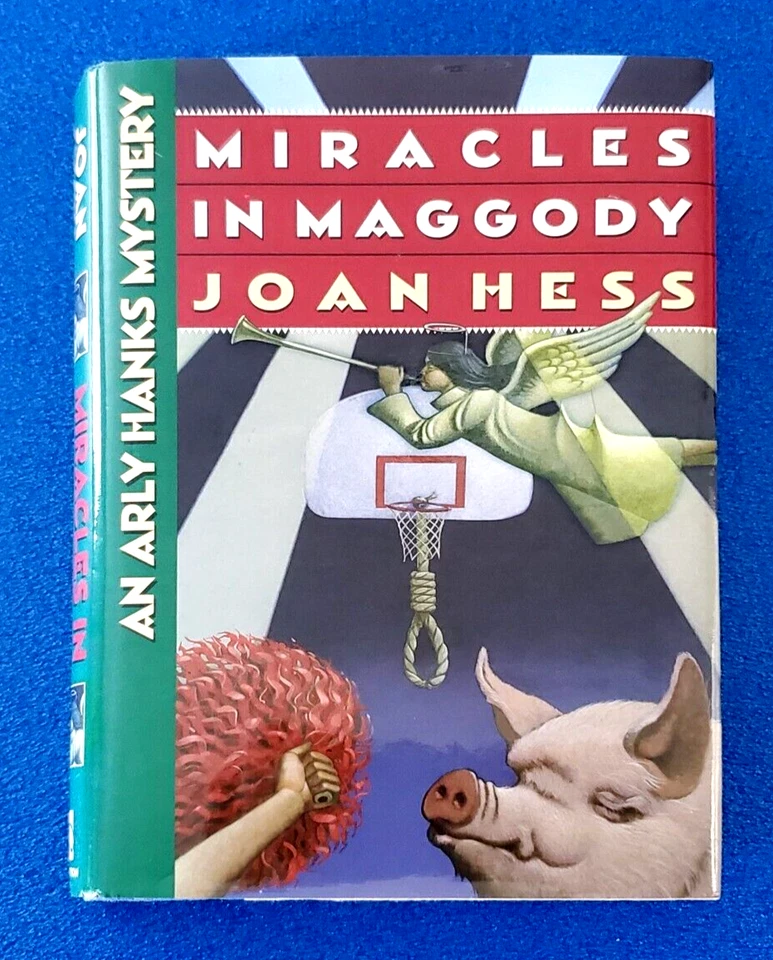 AN ARLY HANKS MYSTERY MIRACLES IN MAGGODY JOAN HESS HARDCOVER SHIPS FREE - Image 1 of 4