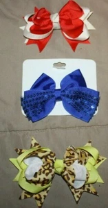 JUEGO DE 3 PINZAS PARA LAZOS PARA EL CABELLO DE NIÑA MULTICOLORES NUEVAS - Imagen 1 de 5