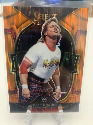 2023 WWE Panini Select "Rowdy" Roddy Piper Orange Flash Concourse #27 - Image 1 of 2