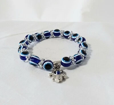 Pulsera Hamsa elástica con cuentas de plástico azul y plata J8-1751 Foto 1 de 2