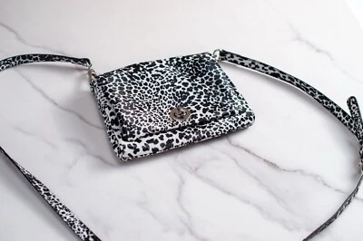 Charming Charlie Black White Animal Print Convertible Clutch Wristlet Crossbody  - Image 1 of 4