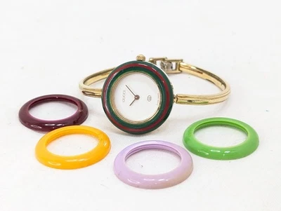 Reloj GUCCI Change Bisel 1100-L Cuarzo Dorado Blanco Para Mujer Funcionando Auténtico Foto 1 de 4