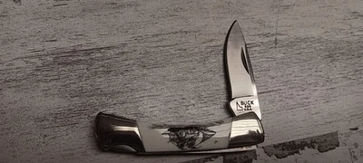 Cuchillo plegable vintage Buck 505 Scrimshaw Lockback EE. UU. Foto 1 de 4