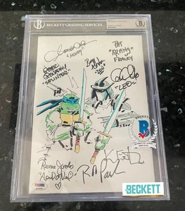 KEVIN EASTMAN SIGNED TMNT 8X10 ART WITH CARTOON CAST BAS COA SHREDDER VS LEO - Picture 1 of 2