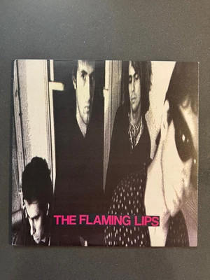 FLAMING LIPS – In A Priest Driven Ambulance US 1990 1st Issue Violet NM Vinyl LP - Image 1 of 4