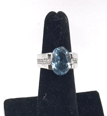 Lia Sophia "Aquarius" Blue Center Stone, CZ Baguette, Silver Statement Ring Sz 5 - Image 1 of 4