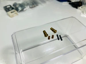 ATLAS MOTORING HO SCALE SERVICE PARTS ~ Brush Barrels, springs & brushes all NOS - Bild 1 von 3