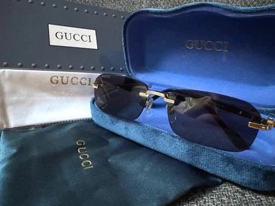 Gucci  Rectangular Rimless Sunglasses GG1221S 001, Black/Gold-Gray Lens 140mm - Image 1 of 4