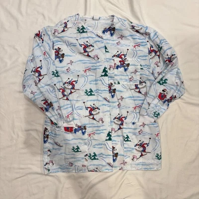 Disney Womens Scrub Top | White Blue | Mickey & Goofy Winter Scene Skating | Med - Image 1 of 4