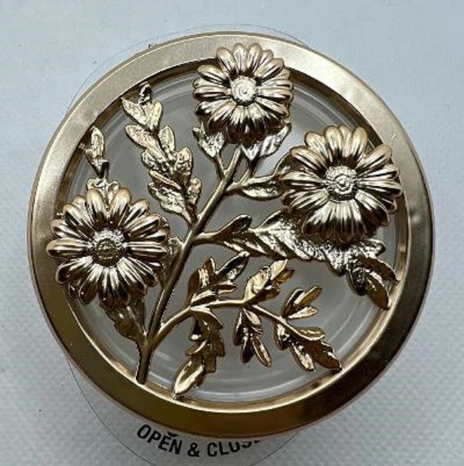 Ambientador de aire portátil con clip para visera y aroma flores doradas Bath & Body Works para automóvil Foto 1 de 1