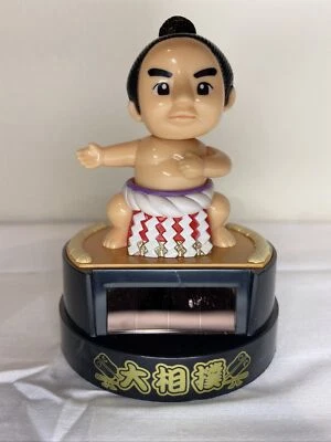solar toy japanese yokozuna  bobblehead doll Sumo wrestler Manufactured in 2006 - Image 1 of 4