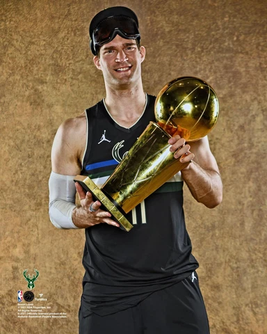 Brook Lopez Milwaukee Bucks Unsigned 2021 NBA Finals Larry O'Brien Trophy Photo Cover