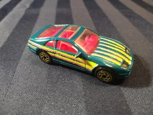 Matchbox 1990 Nissan 300ZX Teal/Pink Diecast Car Loose No Packaging Gold Rims - Picture 1 of 5
