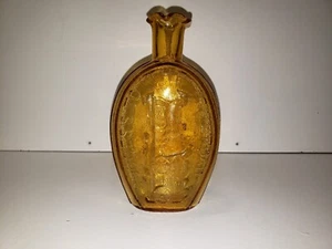 Frasco de botella de vidrio ámbar en relieve vintage de 7" Success to the Railroad - Imagen 1 de 4