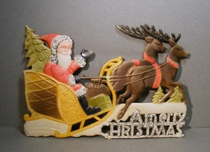 Cartón troquelado alemán vintage troquelado en relieve Feliz Navidad Santa en trineo - Imagen 1 de 4