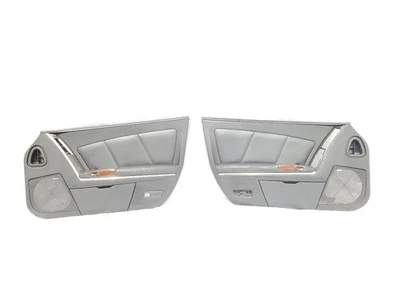 Cadillac XLR 2005 OEM par de molduras de puerta negro  Foto 1 de 4