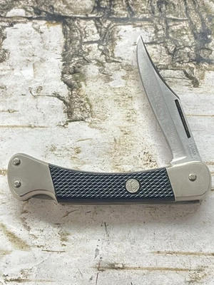 Cuchillo Puma 1986 alemán 230260 teniente negro sintético con bloqueo Foto 1 de 4