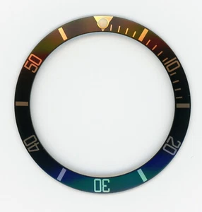 Lünetteneinsatz 16808-1 schwarz/gold für Rolex "CLARK" ersetzt 315-16808-1 - Bild 1 von 1