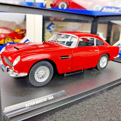 VOITURE SOLIDO ASTON MARTIN DB5 METALIC RED 1964 1:18 NEUF BOITE S1807103 - Photo 1/4