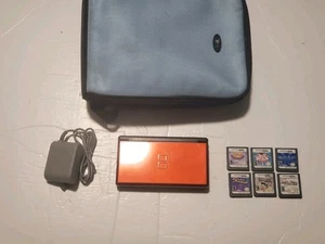 CRIMSON RED BLACK NINTENDO DS LITE CONSOLE USG-USA-001 W/ OEM CHARGER & 7 GAMES - Picture 1 of 14