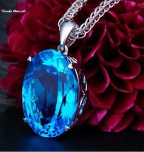 PRECIOSA CADENA Y COLGANTE OVAL CON UNA PIEDRA DE CRISTAL AZUL MÍSTICO OCÉANO - Picture 1 of 4