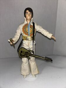 elvis doll with Clothes, Shoes, Guitar And Microphone. Preowned