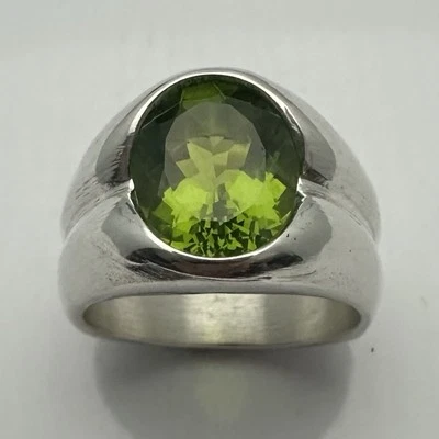 ANILLO HOMBRE PLATA ESTERLINA MJG. PERIDOTO DE LABORATORIO OVALADO 12 x 10 mm. TALLA 10. Foto 1 de 4