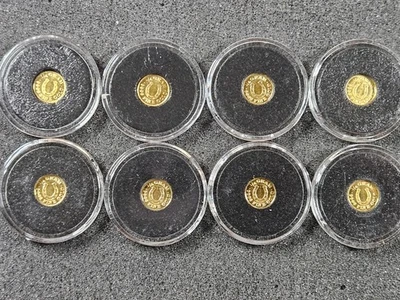 🌟(8) Monarch Precious Metals 0.25 g .9999 Gold Horseshoe Rounds, 2 g TOTAL - Image 1 of 4