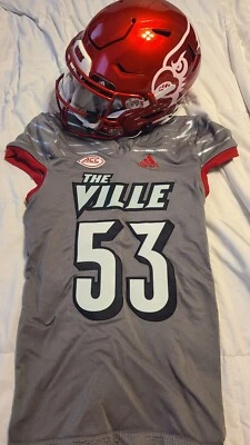 Louisville Cardinals 2022 Riddell Game Worn Helmet + Iron Wings Game Used Jersey - Image 1 of 4